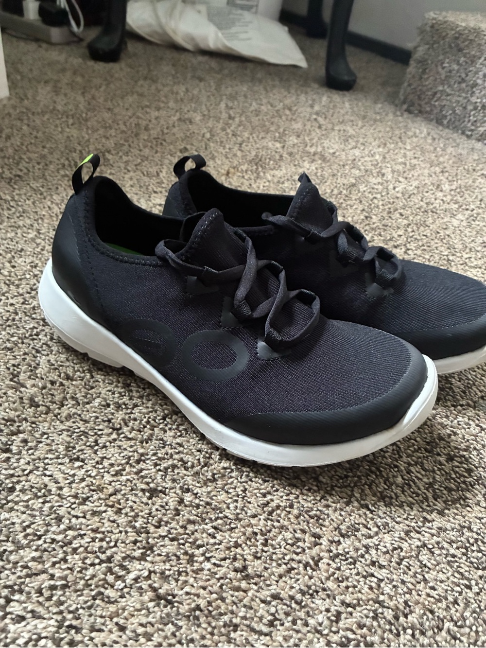 OOFOS Women's Black Knit Athletic Slip-On Sneakers with White Sole